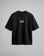 Camiseta oversize Hashira The Elite de Demon Slayer, color negro, estampado naranja, vista frontal