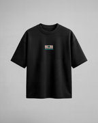Camiseta oversize Hashira The Elite de Demon Slayer, color negro, estampado turquesa, vista frontal